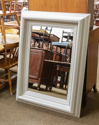 Lot 1384 - A modern grey painted mirror with moulded...