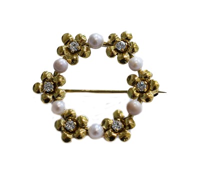 Lot 194 - An 18 carat gold diamond and cultured pearl...