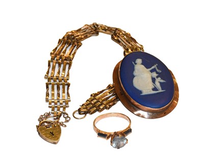 Lot 280 - A 9 carat gold gate link bracelet with heart...