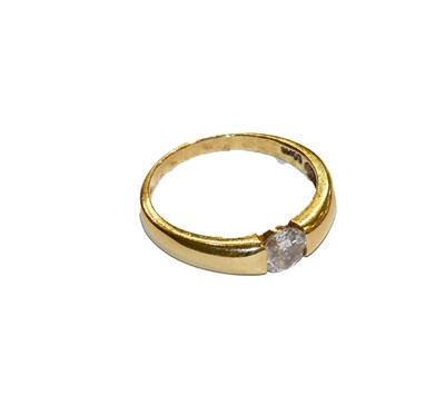 Lot 264 - An 18 carat gold diamond solitaire ring,...