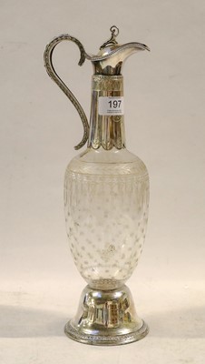 Lot 197 - A silver plated and engraved claret jug