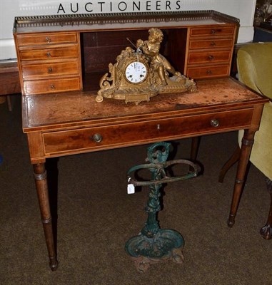 Lot 565 - A 19th century mahogany writing table with superstructure back and eight small drawers