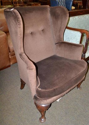 Lot 572 - Early 20th century wingback chair