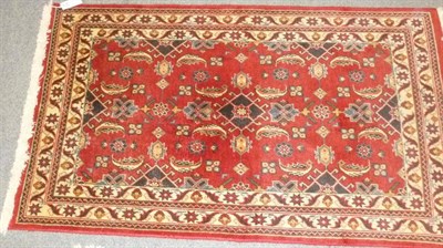 Lot 581 - An Abadeh rug, South West Persia, the blood red field of Herati design enclosed by double...