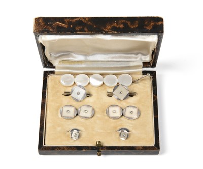 Lot 2346 - A Diamond and Mother-of-Pearl Cufflink, Dress Stud and Button Suite