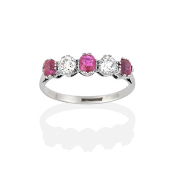 Lot 2323 - A Ruby and Diamond Five Stone Ring