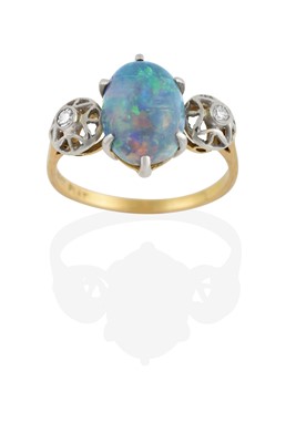Lot 2078 - An Opal and Diamond Three Stone Ring