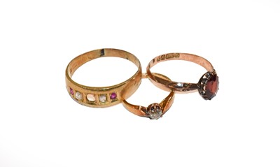 Lot 202 - A 9 carat gold garnet ring, finger size M1/2;...