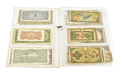 Lot 2297 - Twenty-Six Chinese and Japanese banknotes