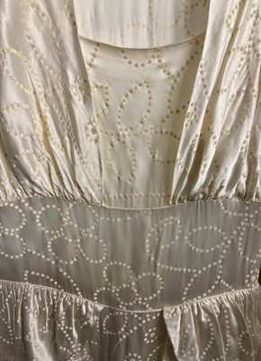 Lot 2052 - Early 20th Century Wedding Gowns, comprising a...