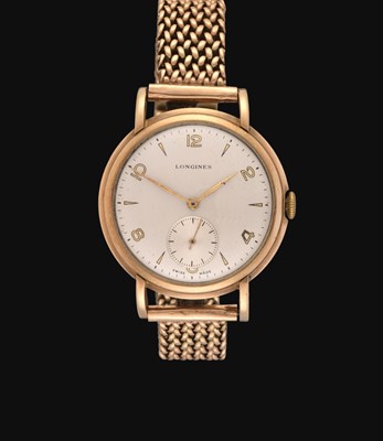 Lot 2255 - Longines: A 9 Carat Gold Wristwatch