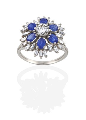 Lot 2069 - A Sapphire and Diamond Cluster Ring