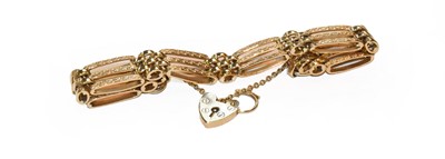 Lot 187 - A 9 carat gold gate link bracelet, length 18cm