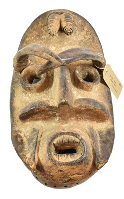 Lot 348 - Three tribal masks, comprising a Grebo Large...