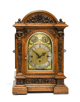 Lot 696 - A Victorian Carved Oak Chiming Table Clock,...