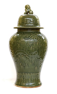 Lot 1317 - A Chinese celadon glazed baluster vase and...