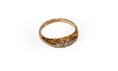 Lot 180 - An 18 carat gold diamond five stone ring,...