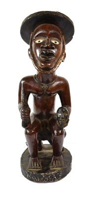 Lot 3228 - A Bembe, Kongo (Bafum) Power Figure, in glossy...