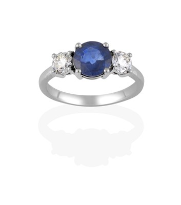 Lot 2364 - A Sapphire and Diamond Three Stone Ring