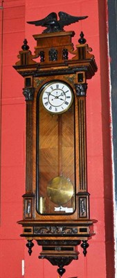 Lot 1025 - A Vienna Striking Wall Clock, circa 1890, surmounted with eagle, door flanked with Corinthian...