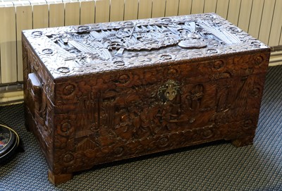 Lot 105 - A 20th century Chinese carved camphorwood...