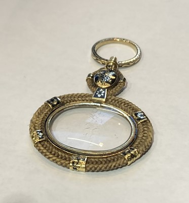 Lot 177 - A mourning hair work and enamel lorgnette,...