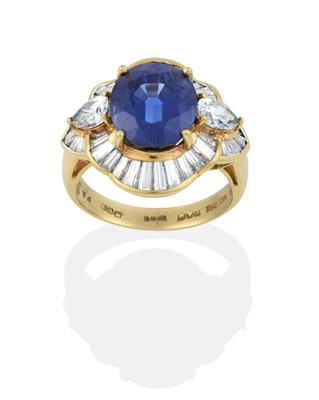 Lot 2048 - An 18 Carat Gold Sapphire and Diamond Ring