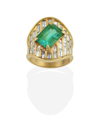 Lot 2057 - An 18 Carat Gold Emerald and Diamond Ring