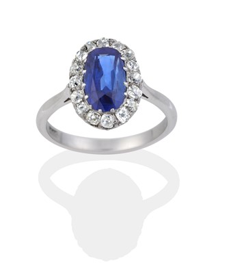 Lot 2044 - A Sapphire and Diamond Cluster Ring