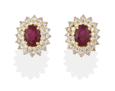 Lot 2052 - A Pair of 18 Carat Gold Ruby and Diamond Cluster Earrings