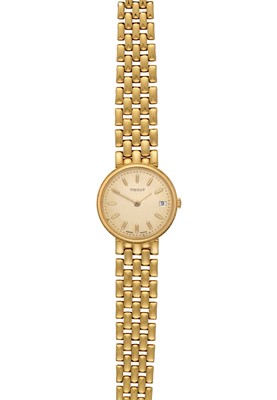 Lot 2272 - Tissot: A Lady's 18 Carat Gold Calendar Wristwatch