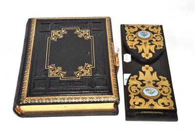 Lot 9 - A Victorian gilt tooled and embossed leather photograph album and a Victorian brass and enamel...