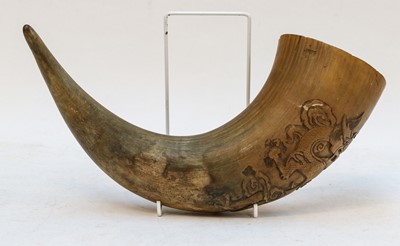 Lot 20 - A Chinese horn, carved in relief with a dragon...
