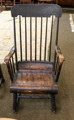 Lot 1372 - An early 19th century stick back rocking chair