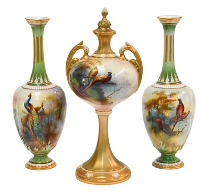Lot 94 - A Royal Worcester twin-handled vase and cover...