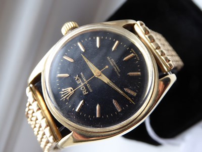 Lot 2118 - Rolex: A Rare 9 Carat Gold Automatic Centre Seconds Wristwatch