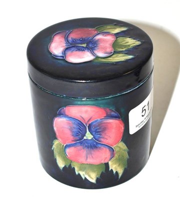 Lot 51 - A William Moorcroft Pansy pattern cylindrical jar and cover, impressed 'MADE IN ENGLAND' with...