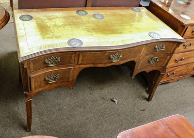 Lot 1353 - A walnut desk and a bergere chair