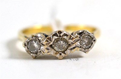 Lot 52 - An 18ct gold diamond three stone ring