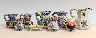 Lot 33 - A quantity of assorted 19th century Hydra jugs,...