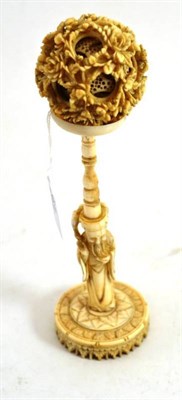 Lot 61 - Chinese carved ivory puzzle ball on a figural stand