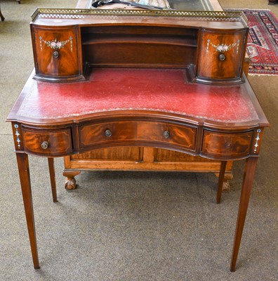 Lot 1447 - A reproduction inlaid mahogany red leather...