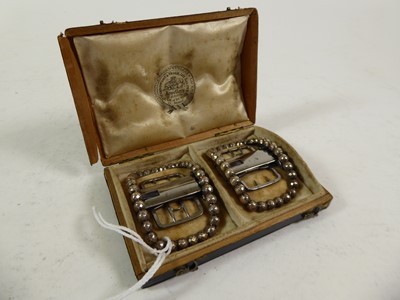 Lot 2197 - A Pair of William IV Silver-Mounted Buckles