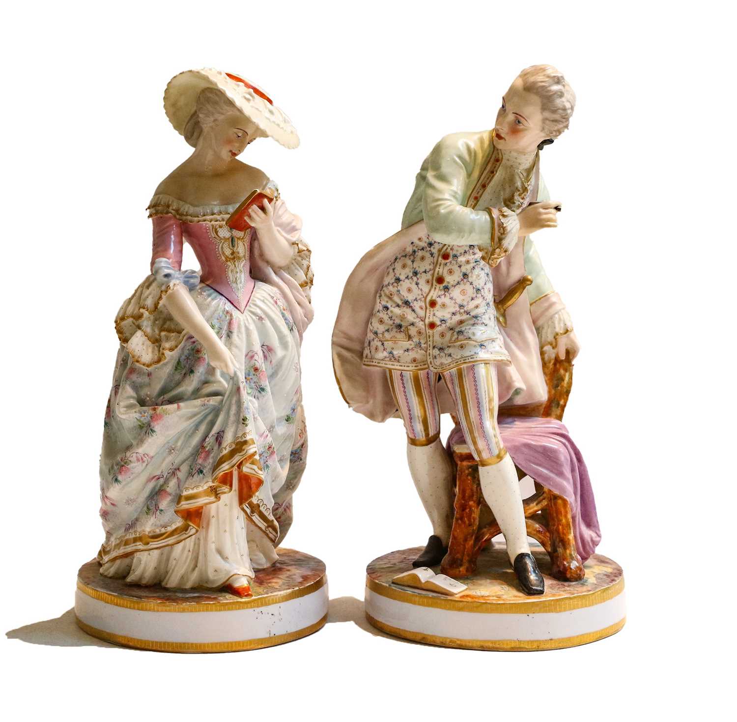 Lot 39 - A large pair of French porcelain figures of a...