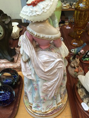Lot 39 - A large pair of French porcelain figures of a...