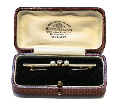 Lot 212 - A diamond and cultured pearl bar brooch,...