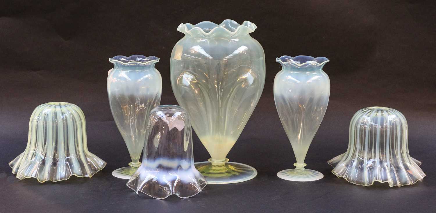 Lot 55 - A garniture of three Victorian vaseline glass...