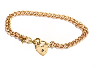 Lot 220 - A curb link bracelet with heart shaped padlock...
