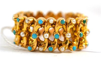 Lot 88 - An expanding bracelet of entwined oval links, inset with small round cabochon turquoise and...