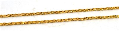 Lot 90 - A fancy link chain, stamped '18K'